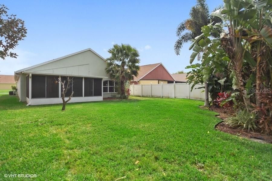 Rear yard with lush landscaping