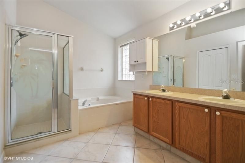 Spa like Master bath with , dual vanities, garden tub and walk in shower