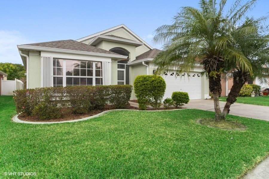 Front Elevation Lush Florida landscaping