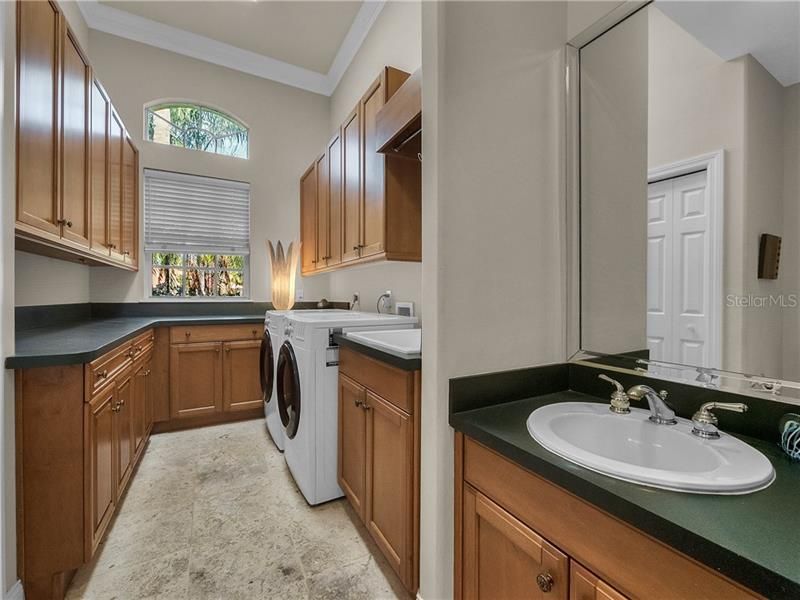 Laundry Room w/custom Built ins & 2 sinks