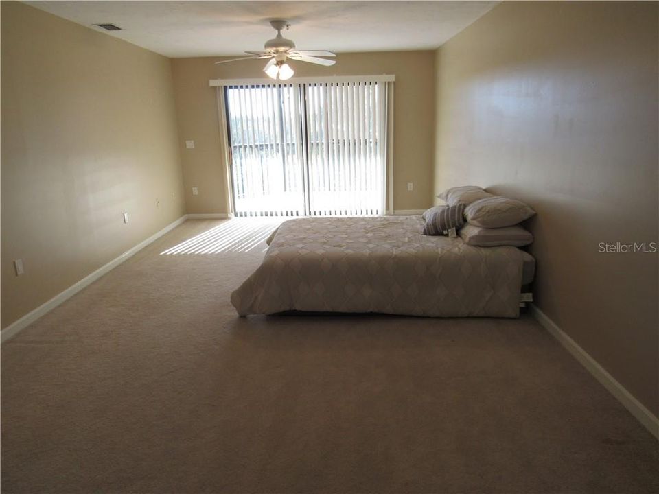 Master bedroom with access to lanai patio