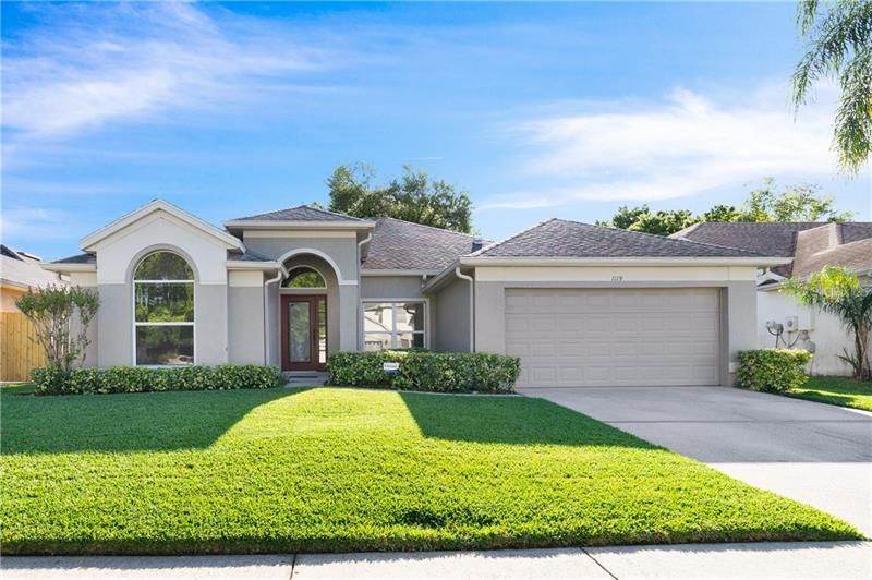 Expect to be impressed with this beautifully UPGRADED home in the sought-after community of Waterford Lakes!