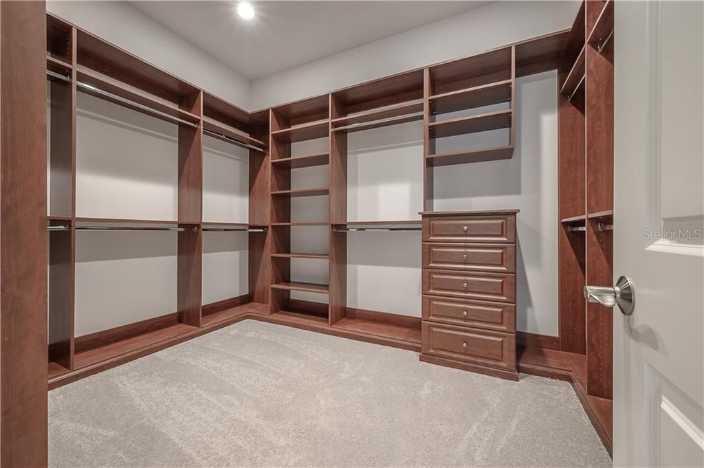 Dream Closet and dressing area. 13'x13', add an island and chandelier to make it yours.