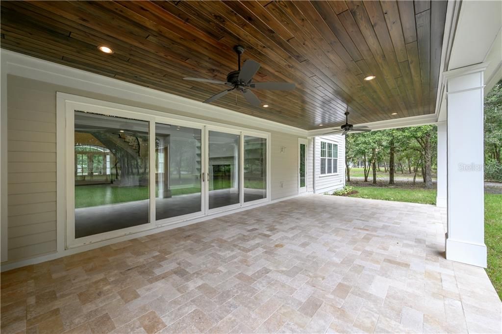 Travertine covered patio space.