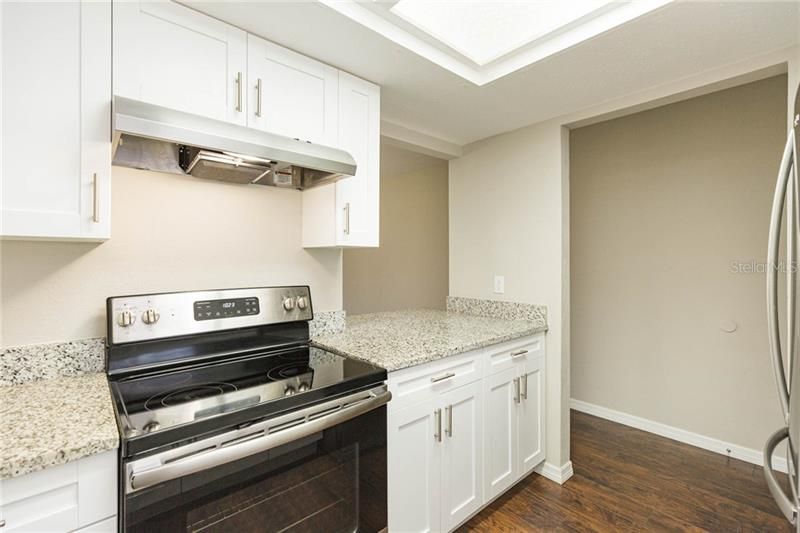 Stainless Steel Kitchen appliances, Granite stone counter-tops, and Premium wood Cabinets with self-closing doors and drawers for safety.