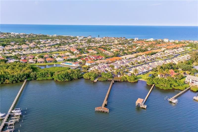 River aerial view showing community fishing pier to enjoy breathtaking sunsets, fishing and relaxation.