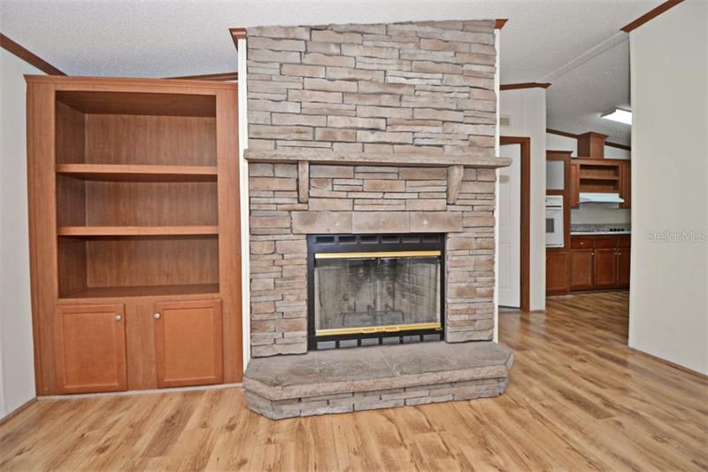 Living Room Stone Fireplace with Built-in