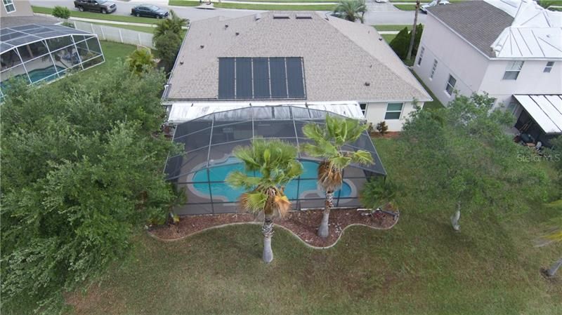 Elevated screened pool and solar heating