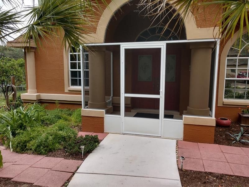 Fully Landscaped Yard And Screened Entryway!