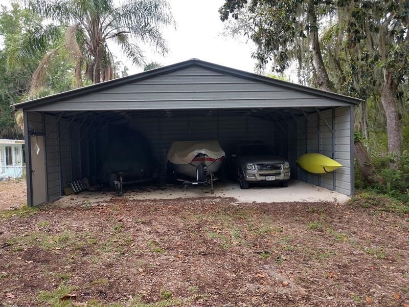 Outbuilding Provides Additional Parking For Your Toys!