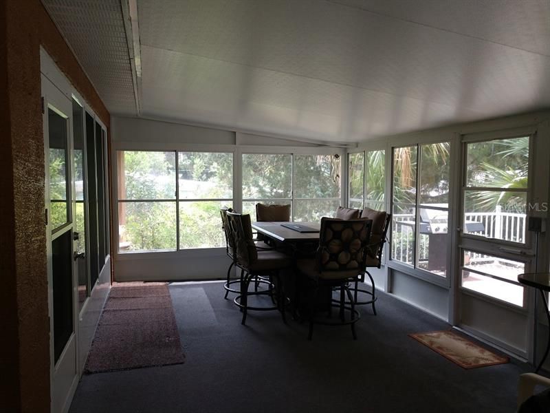 Huge Enclosed Patio Facing The Deck And Overlooking The Lake!