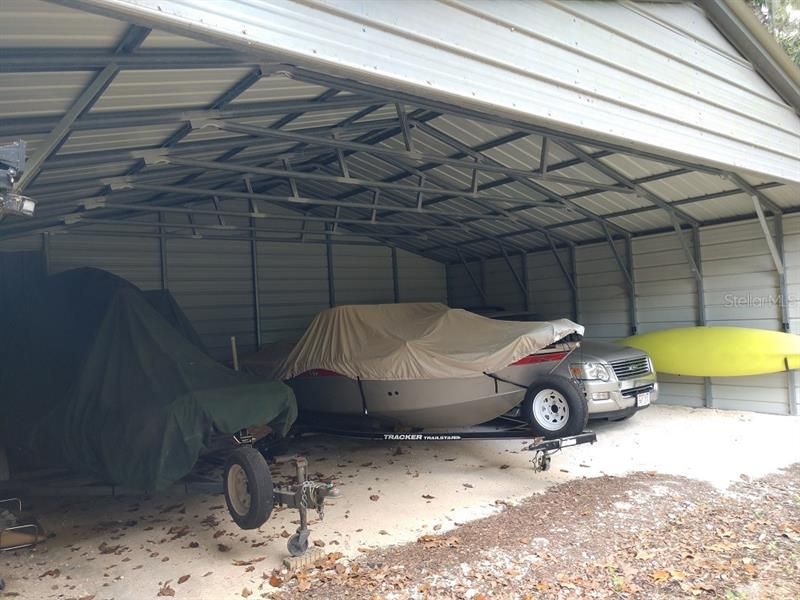 Outbuilding Provides Additional Parking For Your Toys!