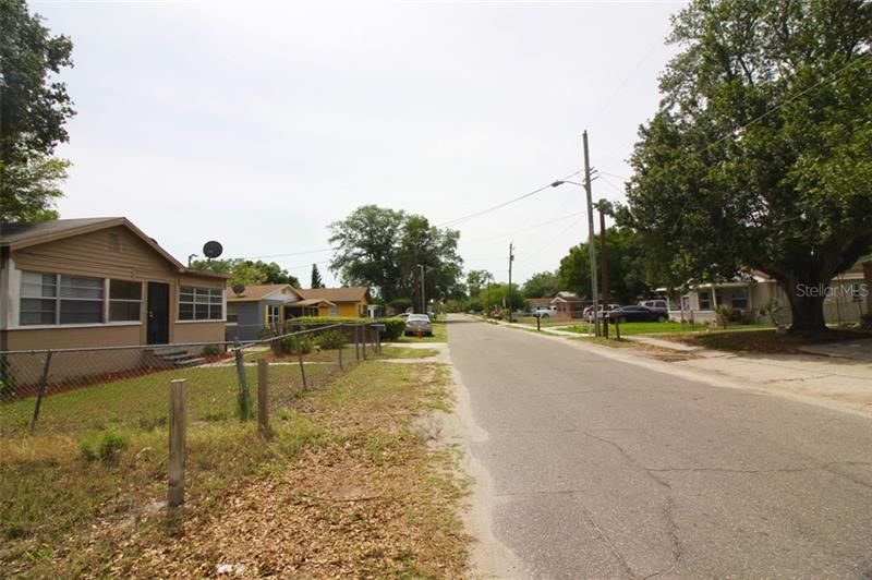 VIEW DOWN THE STREET FROM THE FRONT OF THE LOT