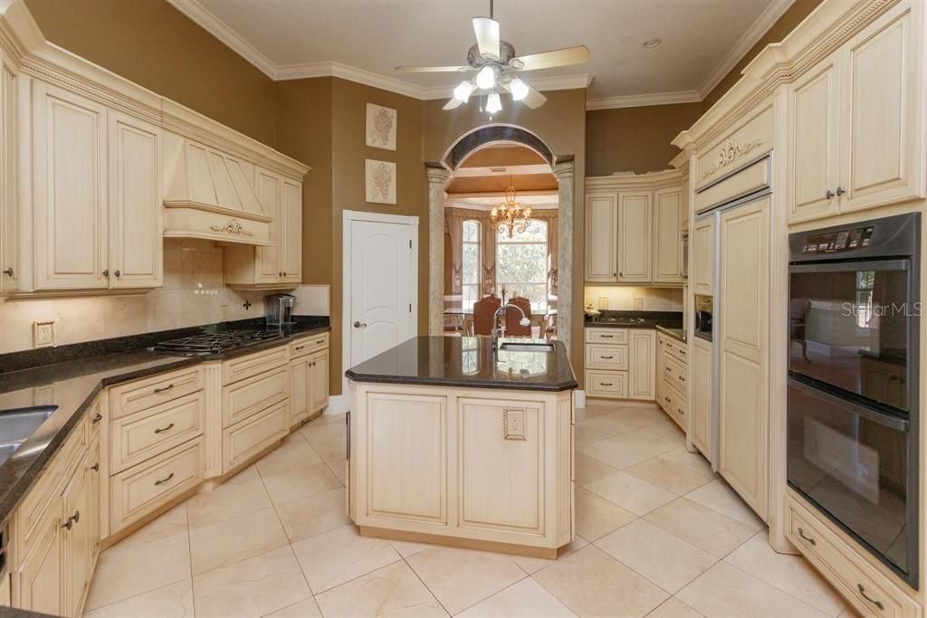 Kitchen Built-in Refrigerator, Double Ovens, Gas Cook Top, Dishwasher, Trash Compactor, Warming Drawer, Microwave