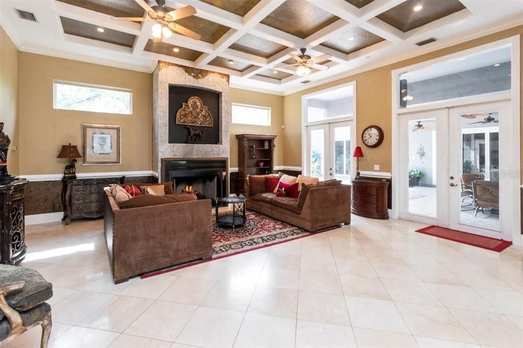 Family Room, Marble Floors leading to Breezeway to Cabana/Guest House & Pool