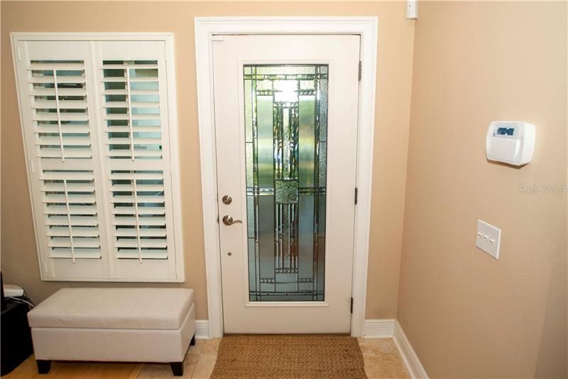 Stunning leaded glass front entry door.