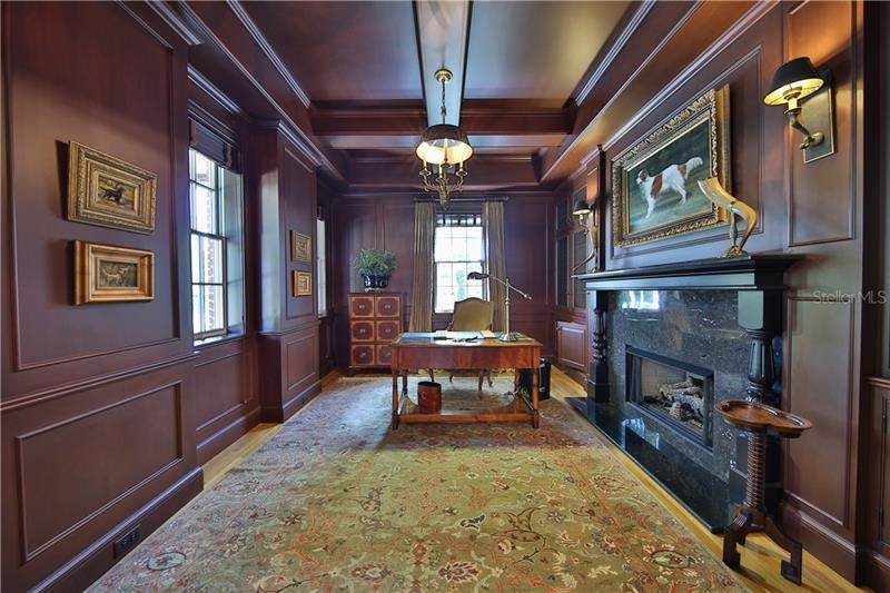 Rich Wood Paneled Office with Fireplace