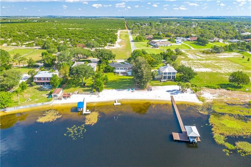 Aerial of lakefront of property