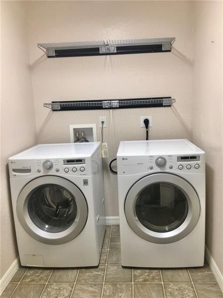 Front load washer & dryer. Pedestals are in garage if wanted.