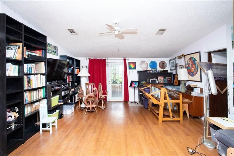 Great room view.  Double glass doors lead out to the covered front porch