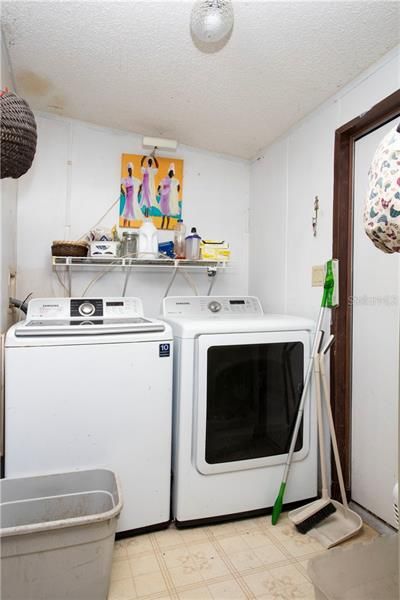 Laundry area is conveniently located off the kitchen