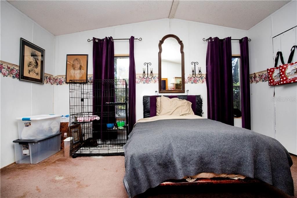 Master bedroom has a walk-in closet and en suite.