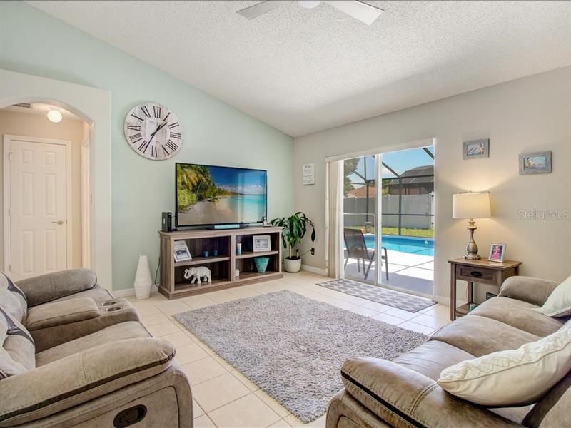 FAMILY ROOM WITH ACCESS TO POOL/LANAI