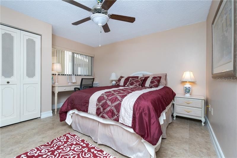 Tile floors are carried through even to the comfortable guest suite.
