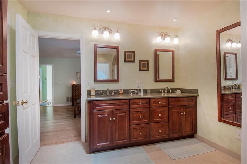Remodeled master bath with double vanity.