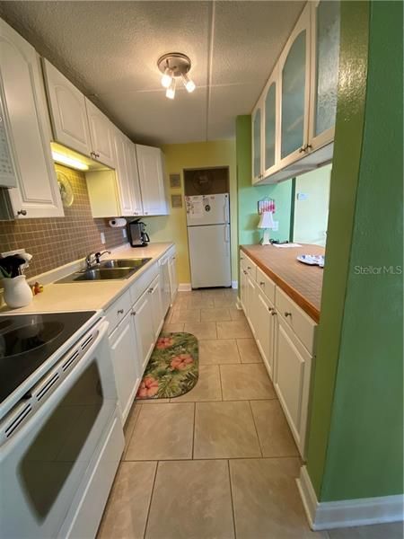 Galley-style kitchen with lots of storage space!