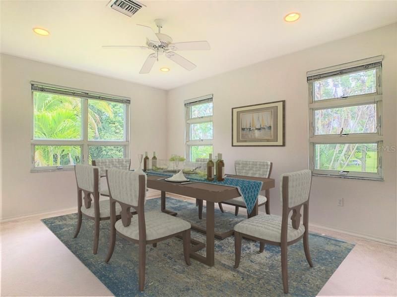 Large dining room with lovely views from 3 windows. Conveniently located off the foyer, it's also a perfect location  for entertaining.