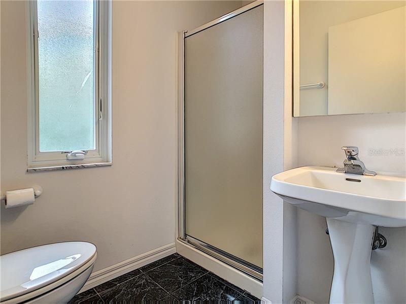 Convenient to the patio / pool area, full bathroom just inside the door.