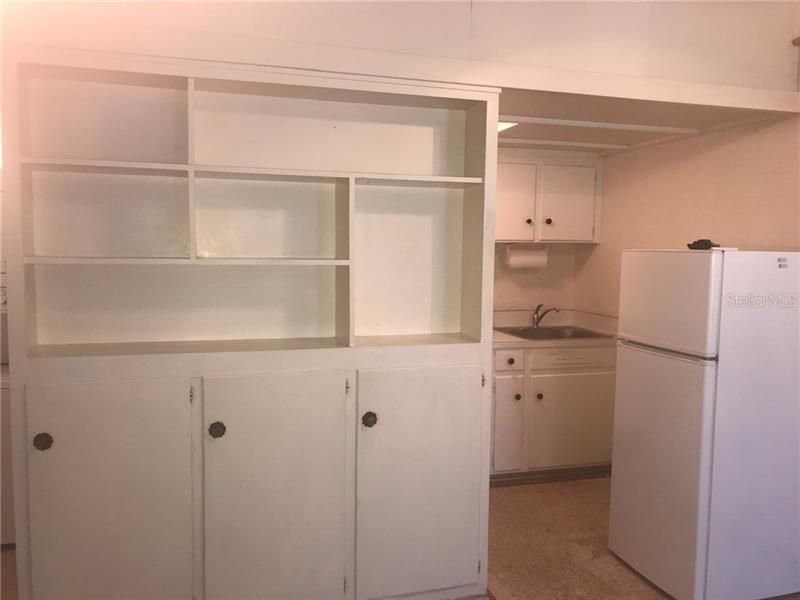 The Built In Cabinets and Shelving offer plenty of storage. Note there is additional overhead storage also.