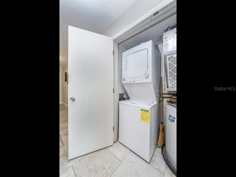 Includes stack-able washer and dryer in closet.