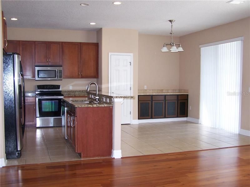 GRANITE KITCHEN COUNTERS - BREAKFAST BAR - CLOSET PANTRY -  DINING AREA