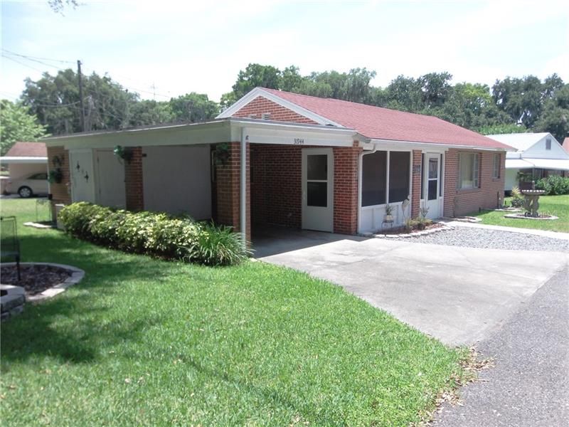 FRONT OF HOME CARPORT AREA