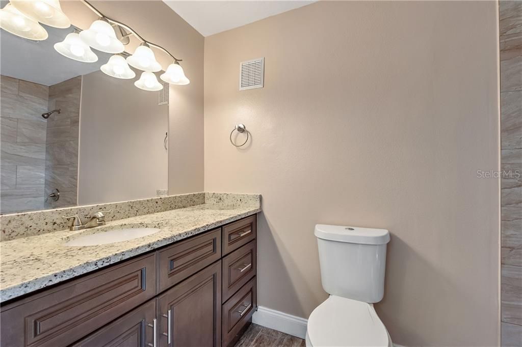 Master bathroom complete with new vanity/granite counter top and beautiful tile shower