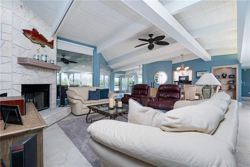 Cozy living room area with wood burning fireplace!