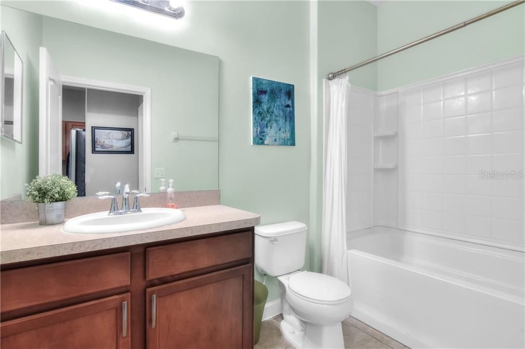 Downstairs full bathroom that accompanies the downstairs 4th bedroom