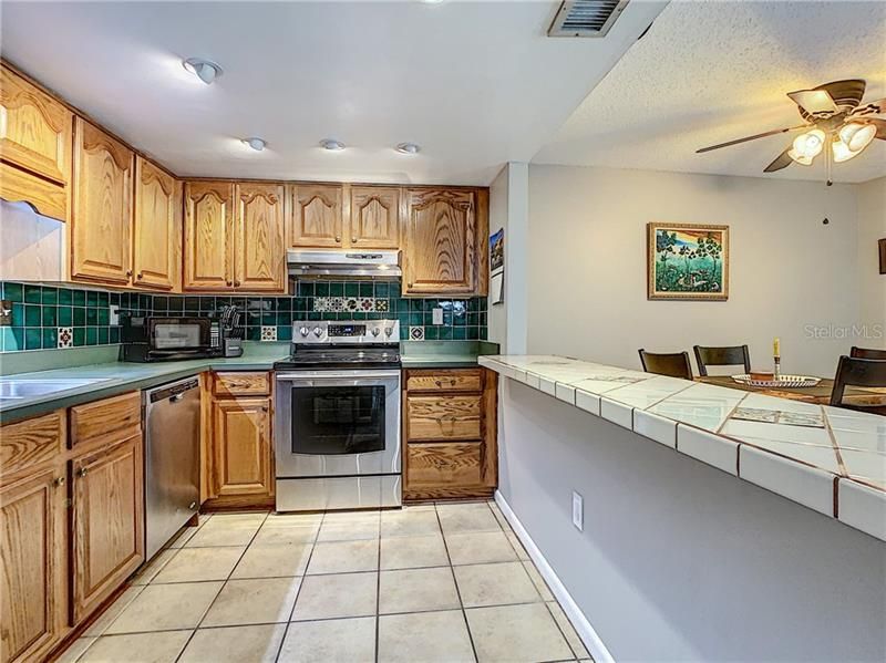 Adorable Updated Kitchen, Stainless Steel Appliances, Solid Wood Cabinetry - Fantastic Lighting