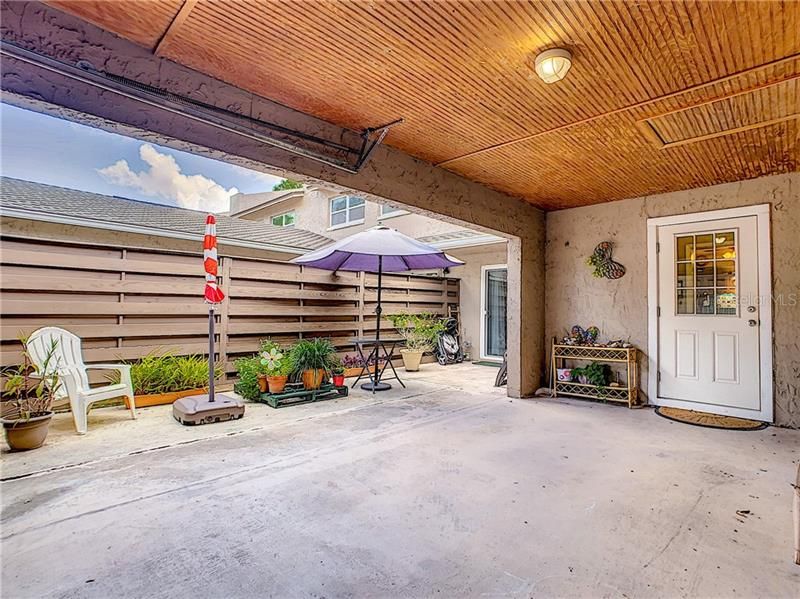 ~ View 2 ~ 1 Car Garage and Private Courtyard for Your Garden Plants and Outdoor Grilling.