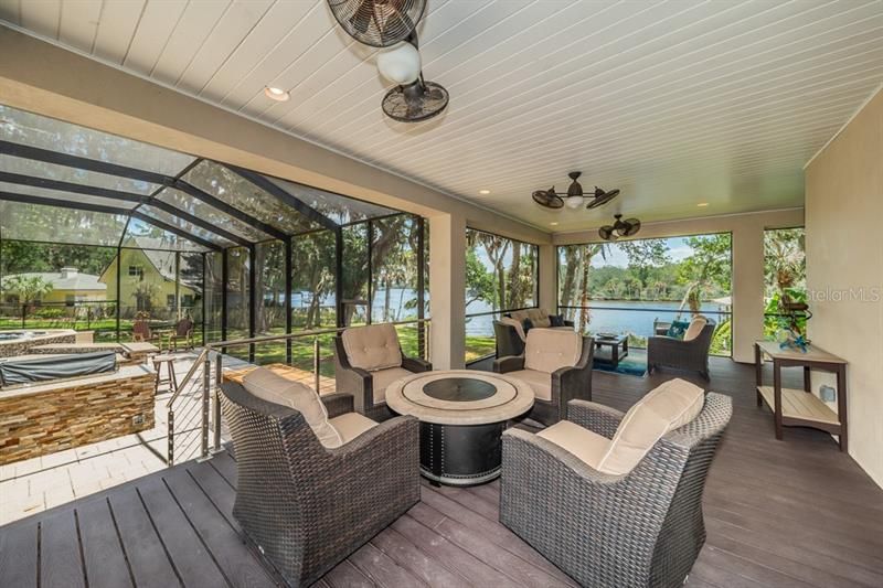 Relax from the wrap around back porch with views of the river.