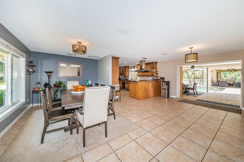 Formal dining room, lots of space for a party or the big family, all opening thru pocketed doors to the lanai and pool area.