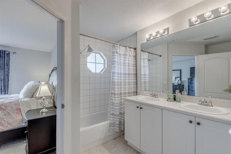 Master bath with dual sinks, corian counter tops