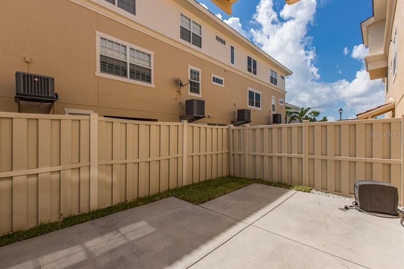 Private Courtyard with large concrete patio for grill and furniture. 20 x 15