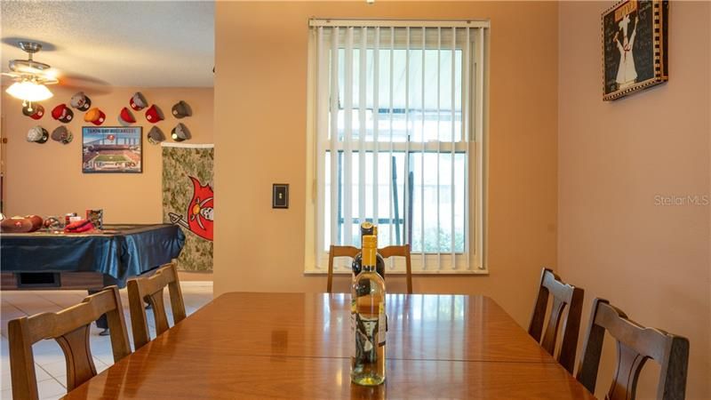 Large 6 person table fits easily in the Dining Area right off the Kitchen