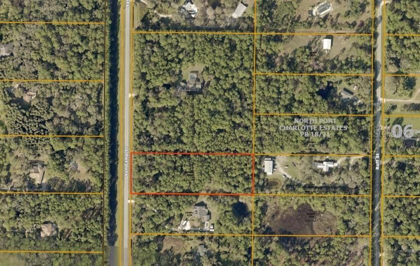 Aerial view of your buildable lot with surrounding custom estates,