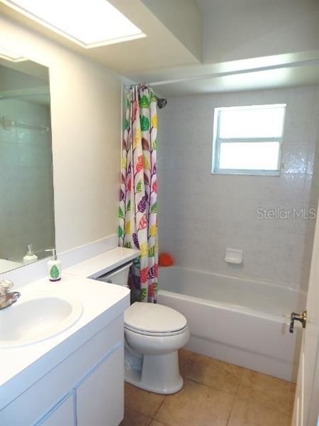 HALL BATHROOM WITH TUB/SHOWER. ENTER FROM POOL!