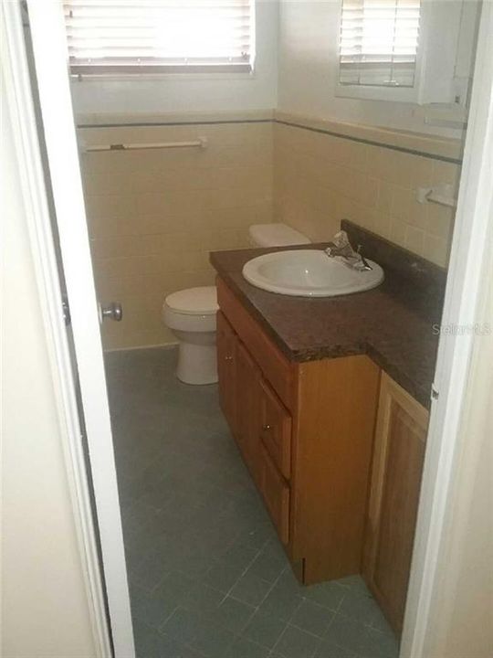 BATHROOM has linen closet and tub/shower combo