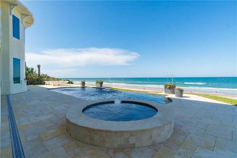 Private infinity pool with spa and sun deck.  Picture taken on a Saturday, although the beach is public- it feels private.